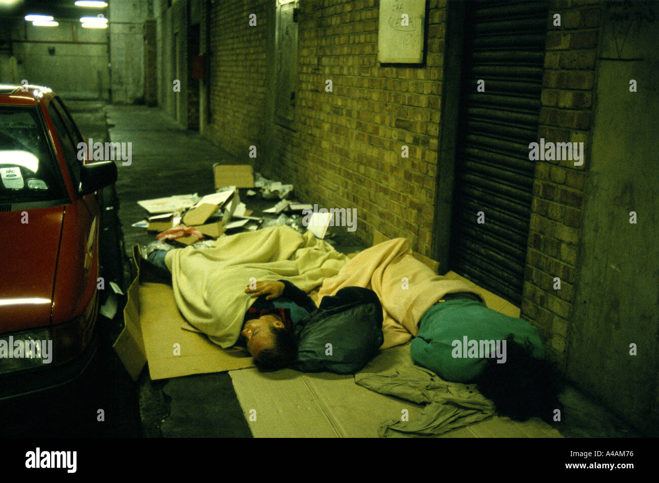 homeless people sleeping in car park 1992 Stock Photo Alamy