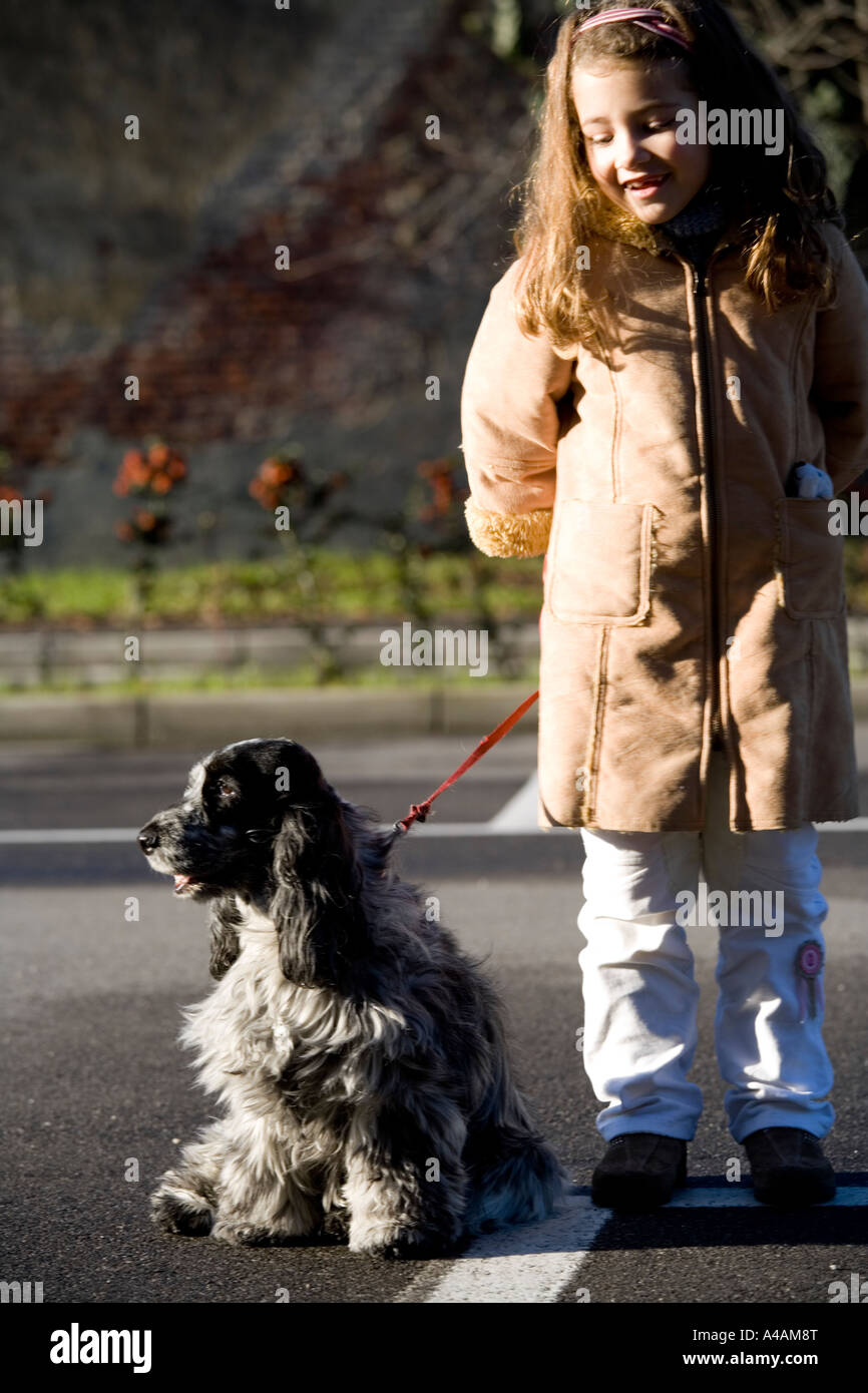 Little girl outdoor with her dog Stock Photo - Alamy