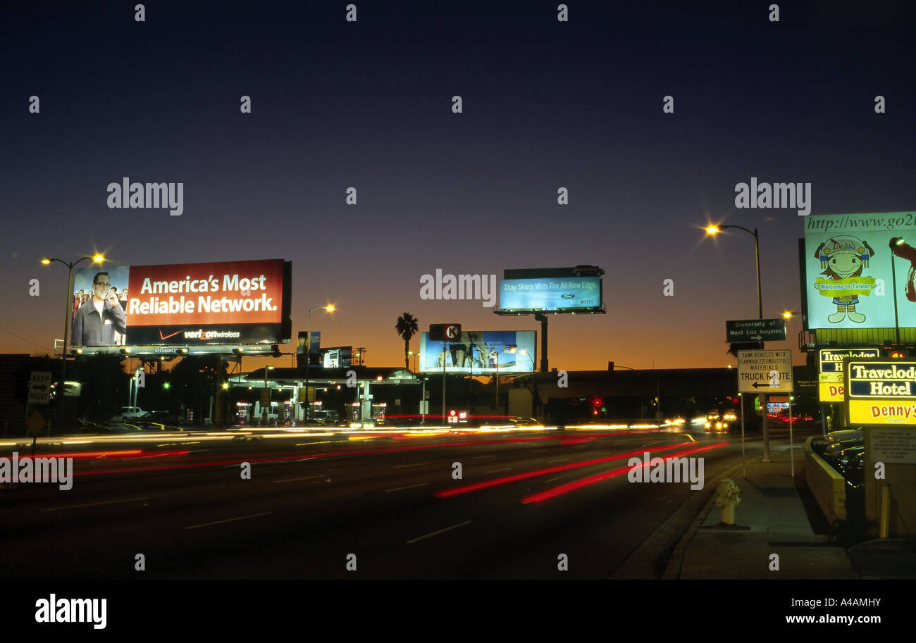 Billboards at dusk along Century Boulevard near LAX, Los Angeles