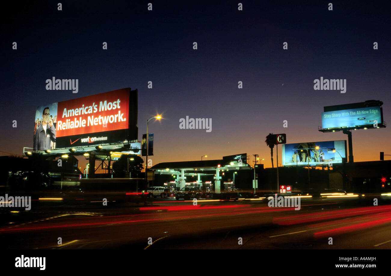 Billboards at dusk along Century Boulevard near LAX, Los Angeles