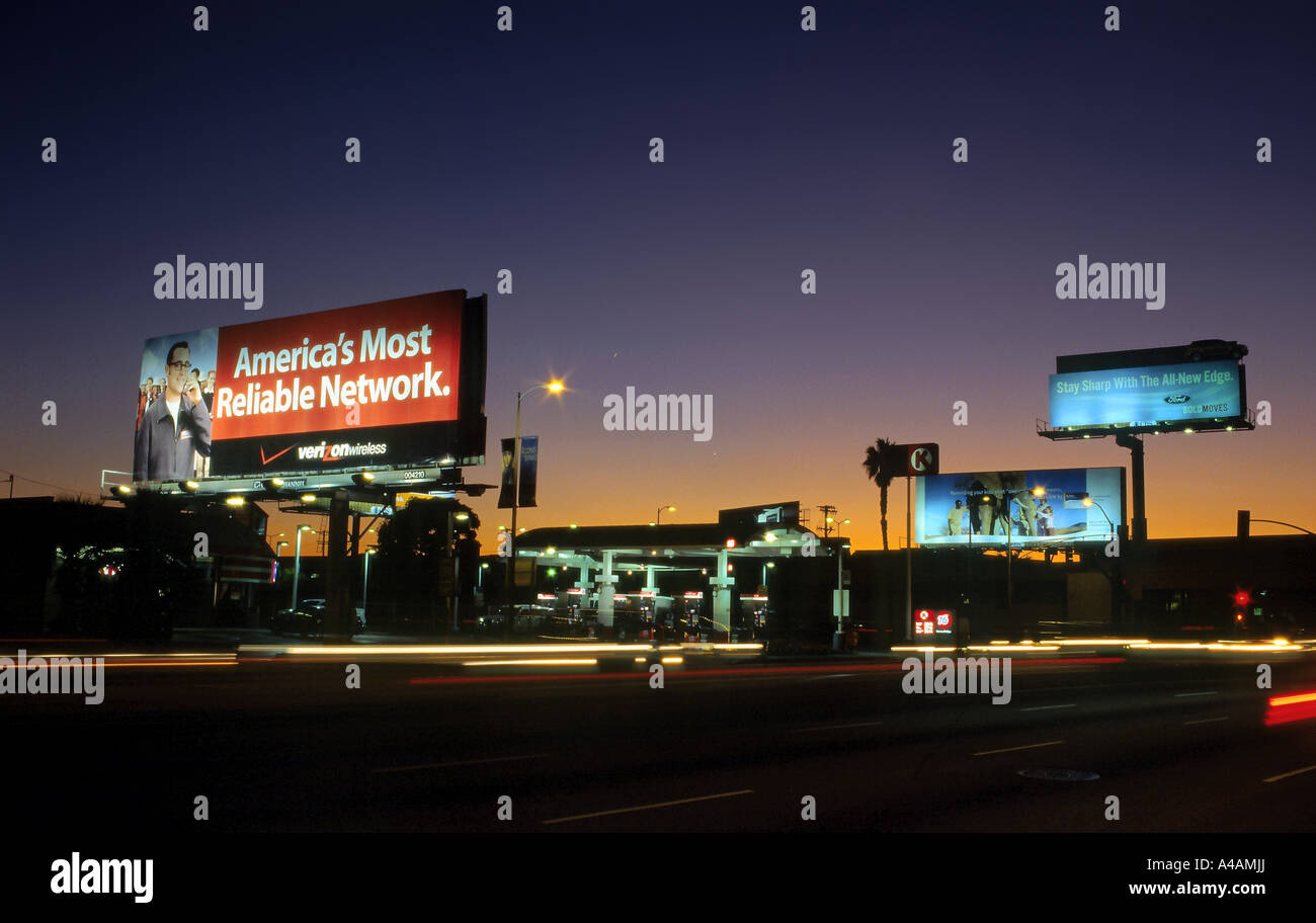 Billboards at dusk along Century Boulevard near LAX, Los Angeles