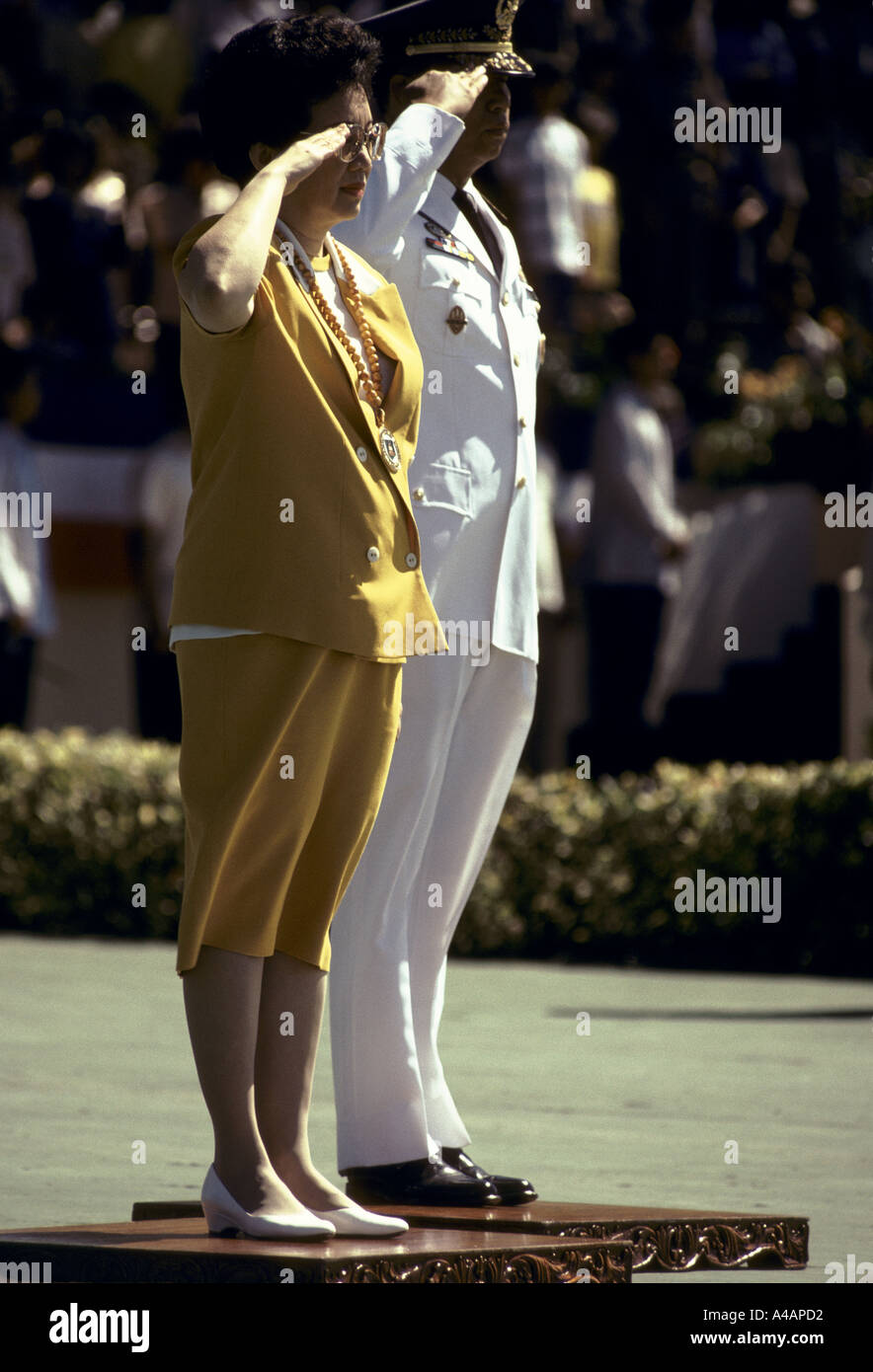 philippines President Corazon Cory Aquino,  commander of the army, saluting the troops at the Army Day celebrations 22 03 1991 Stock Photo