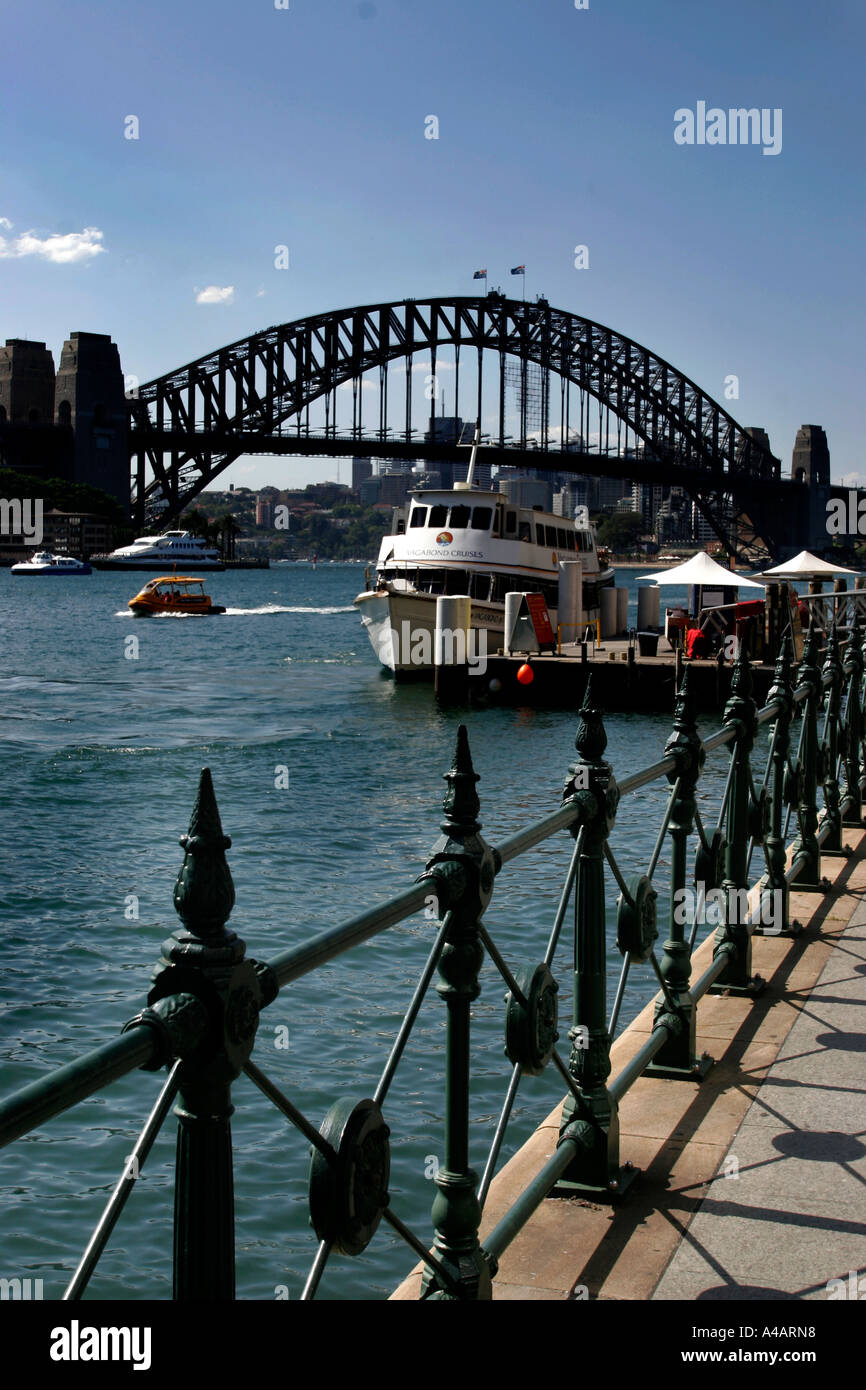 Circular quay Sydney with harbour bridge and tour boat Stock Photo