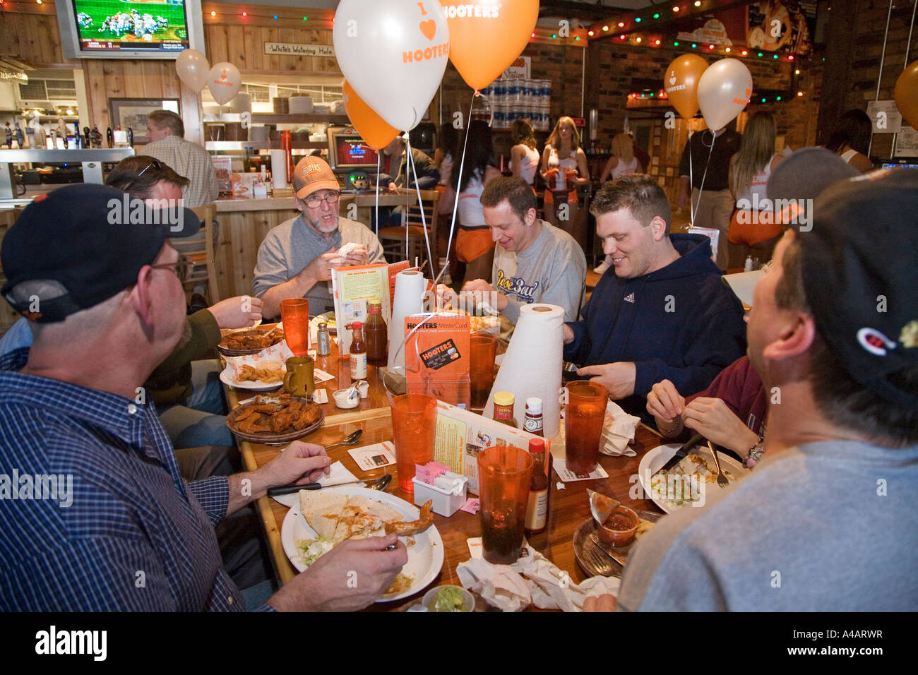 Troy Michigan Customers eat lunch during the grand opening of a Hooters restaurant Stock Photo