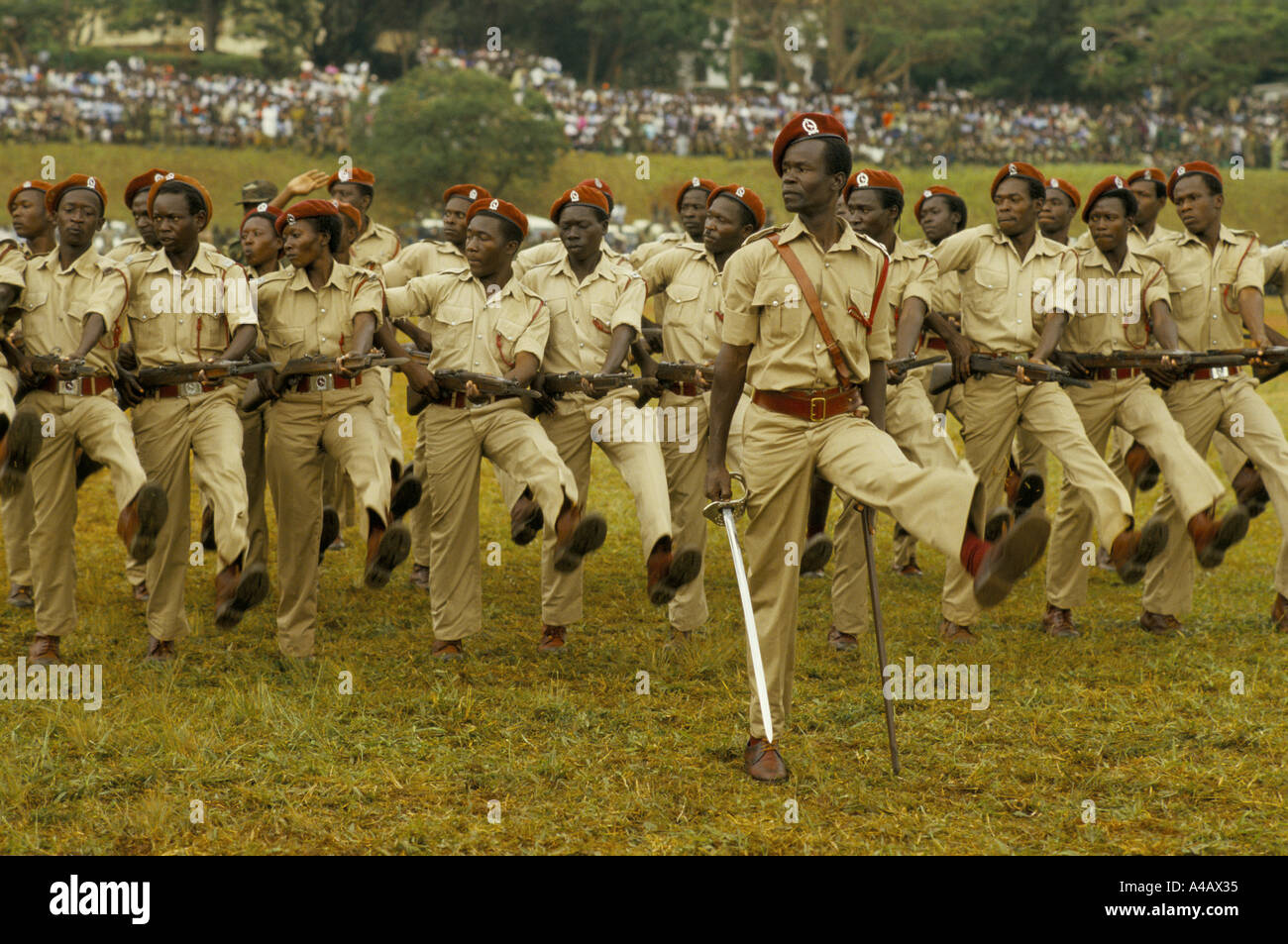 marching soldiers parade with rifles at celebration of first