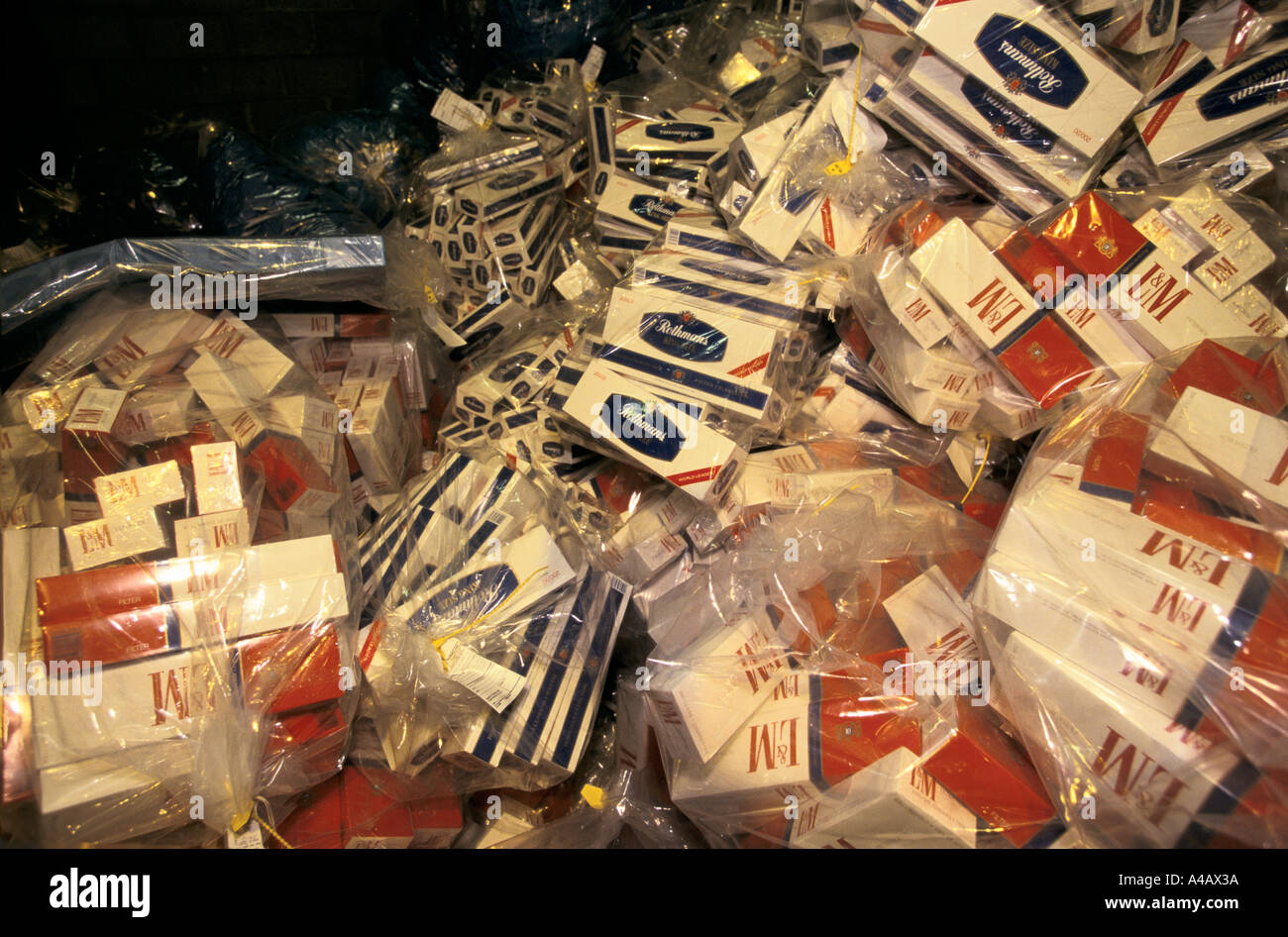 Cigarettes confiscated by UK Customs and Excise officers at Dover port from people trying to smuggle into the UK. Stock Photo
