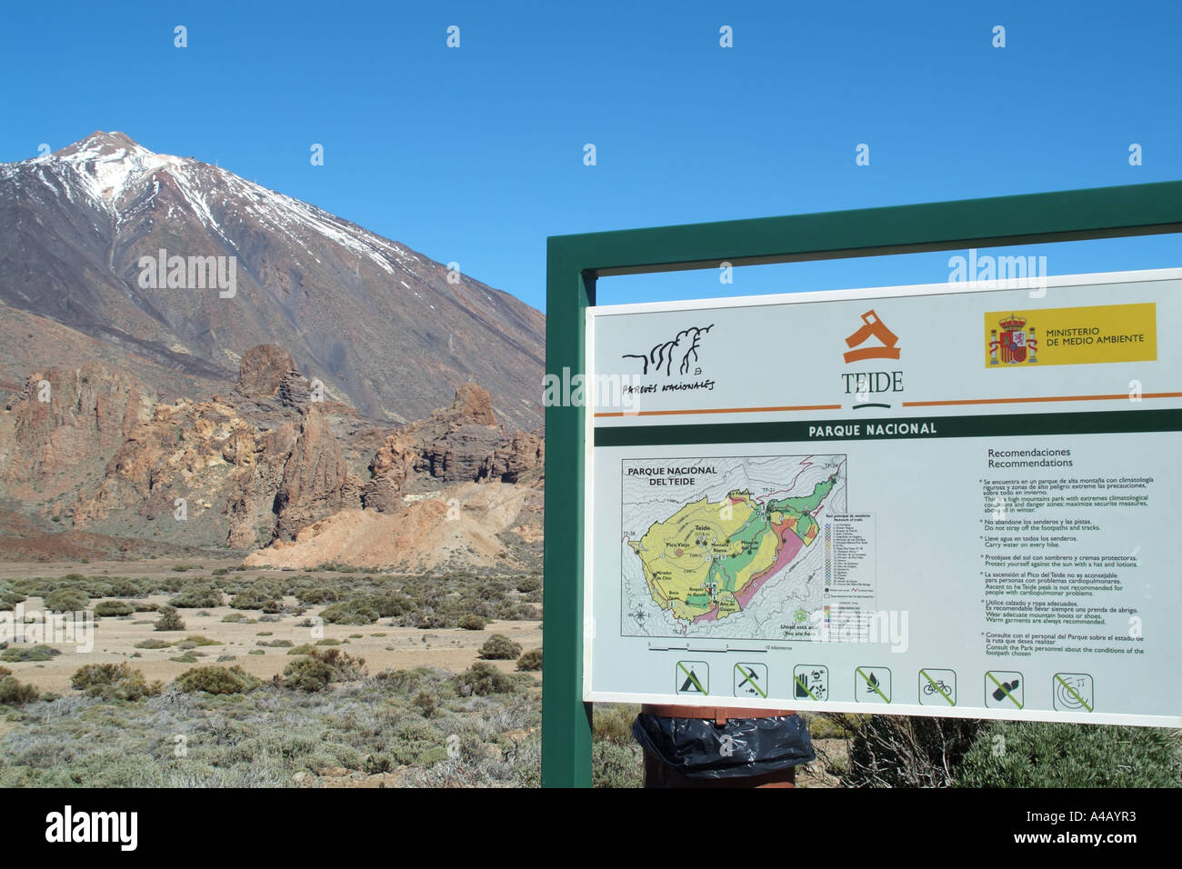 Teide National Park Tenerife Canary Islands Spain map signage and snow capped peak of mount Teide Stock Photo