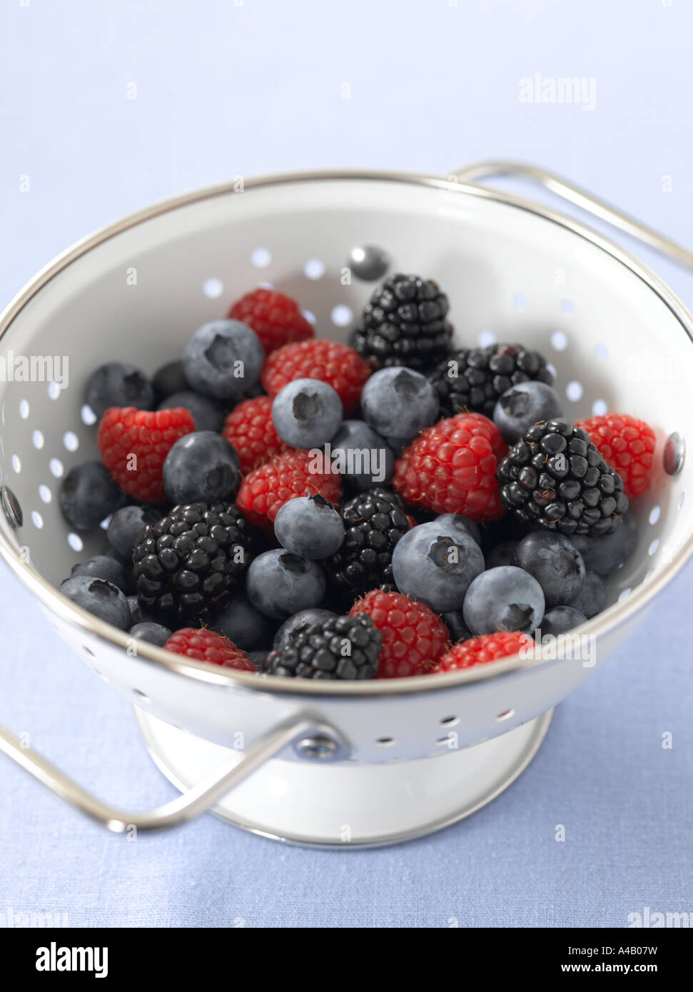 Fresh Berries in Colander Stock Photo