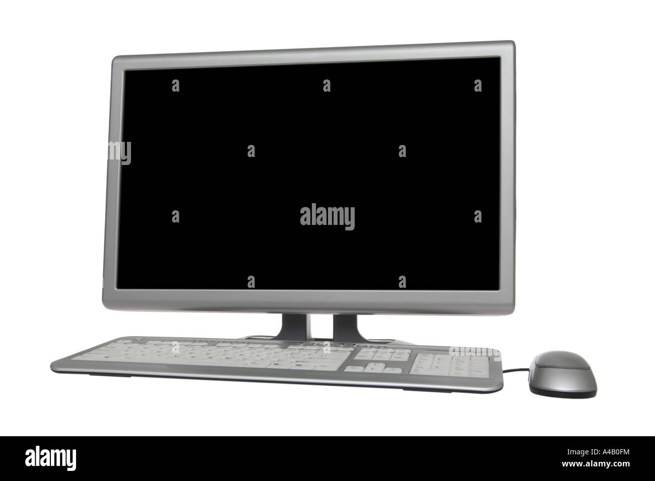 Computer with Widescreen Monitor cut out on white background Stock Photo