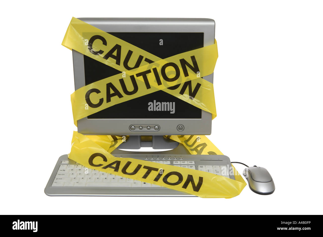 Caution Tape on Computer cut out on white background Stock Photo