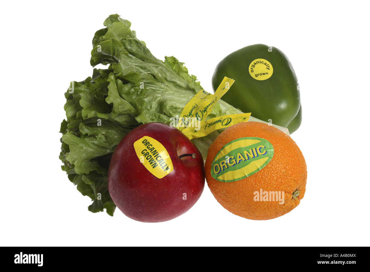 Fruits and Vegetables with Organic Labels cut out on white background Stock Photo
