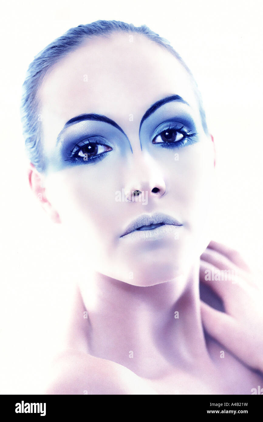 womans face with blue makeup Stock Photo Alamy