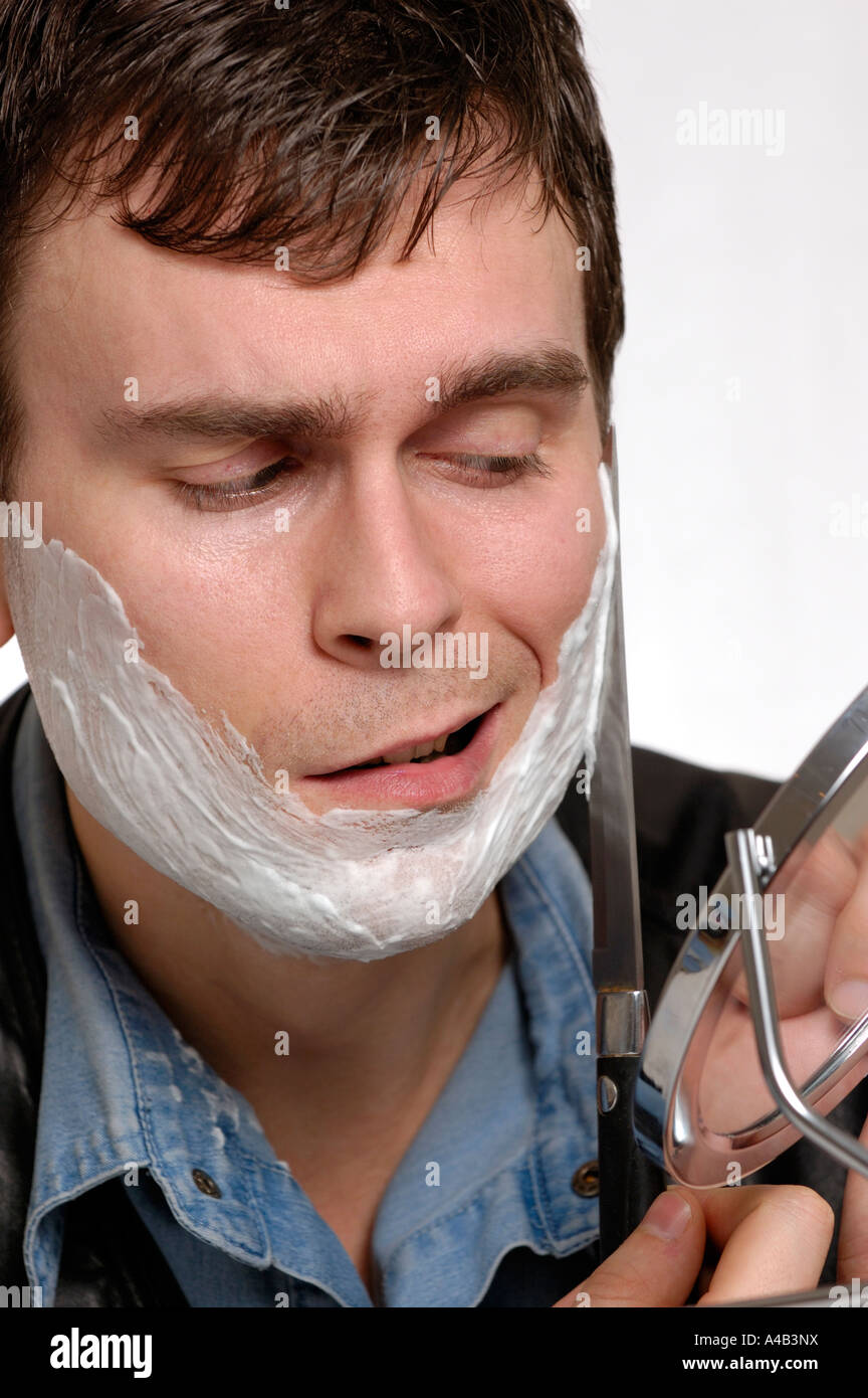 Shaving with a knife Stock Photo Alamy