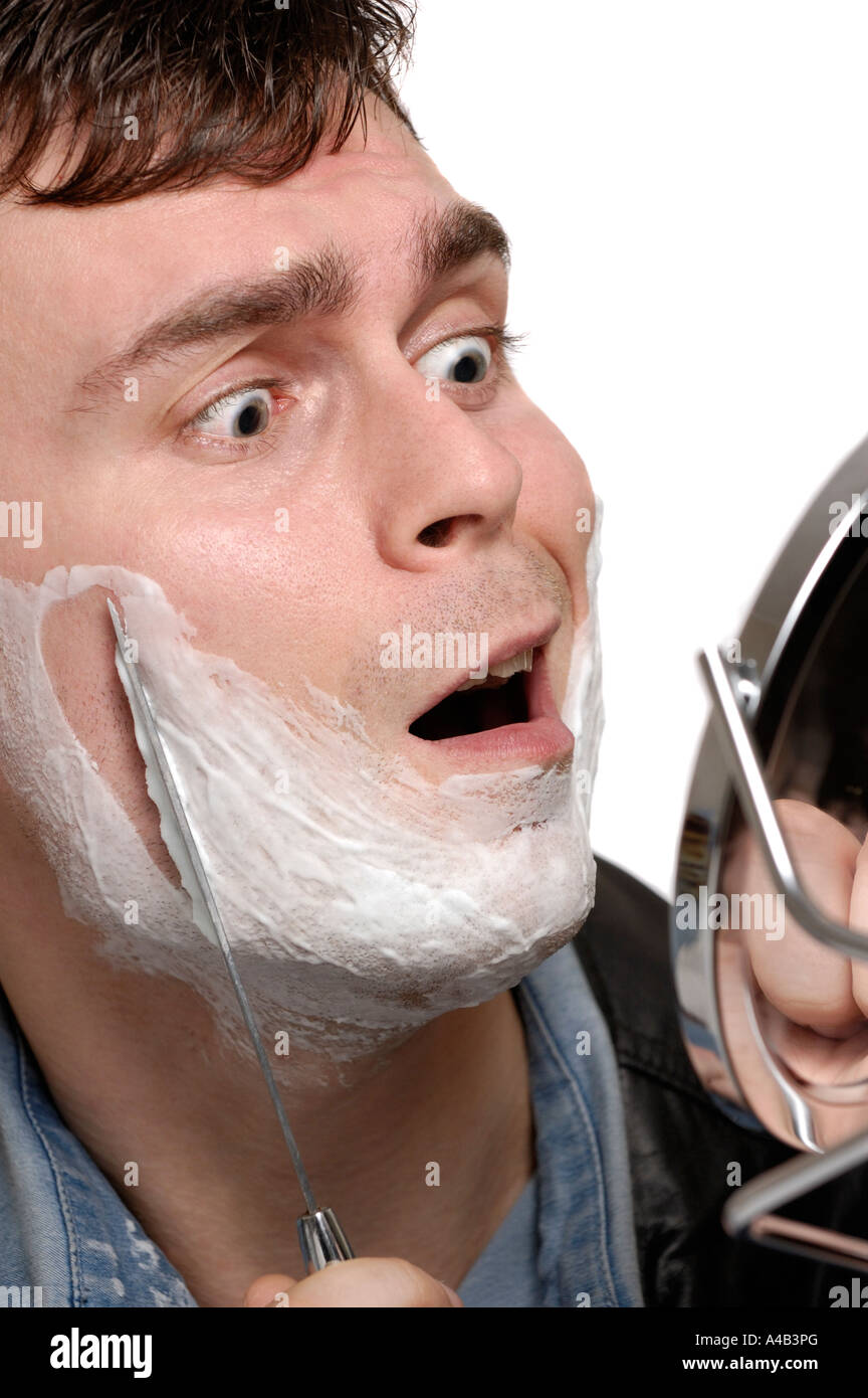 Shaving with a knife Stock Photo