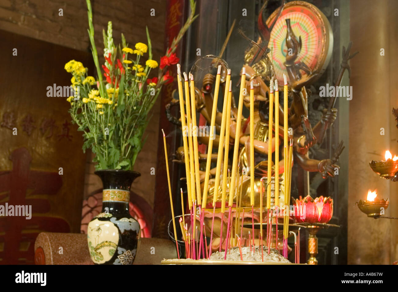Buddhist Altar With Incense Stock Photo Alamy