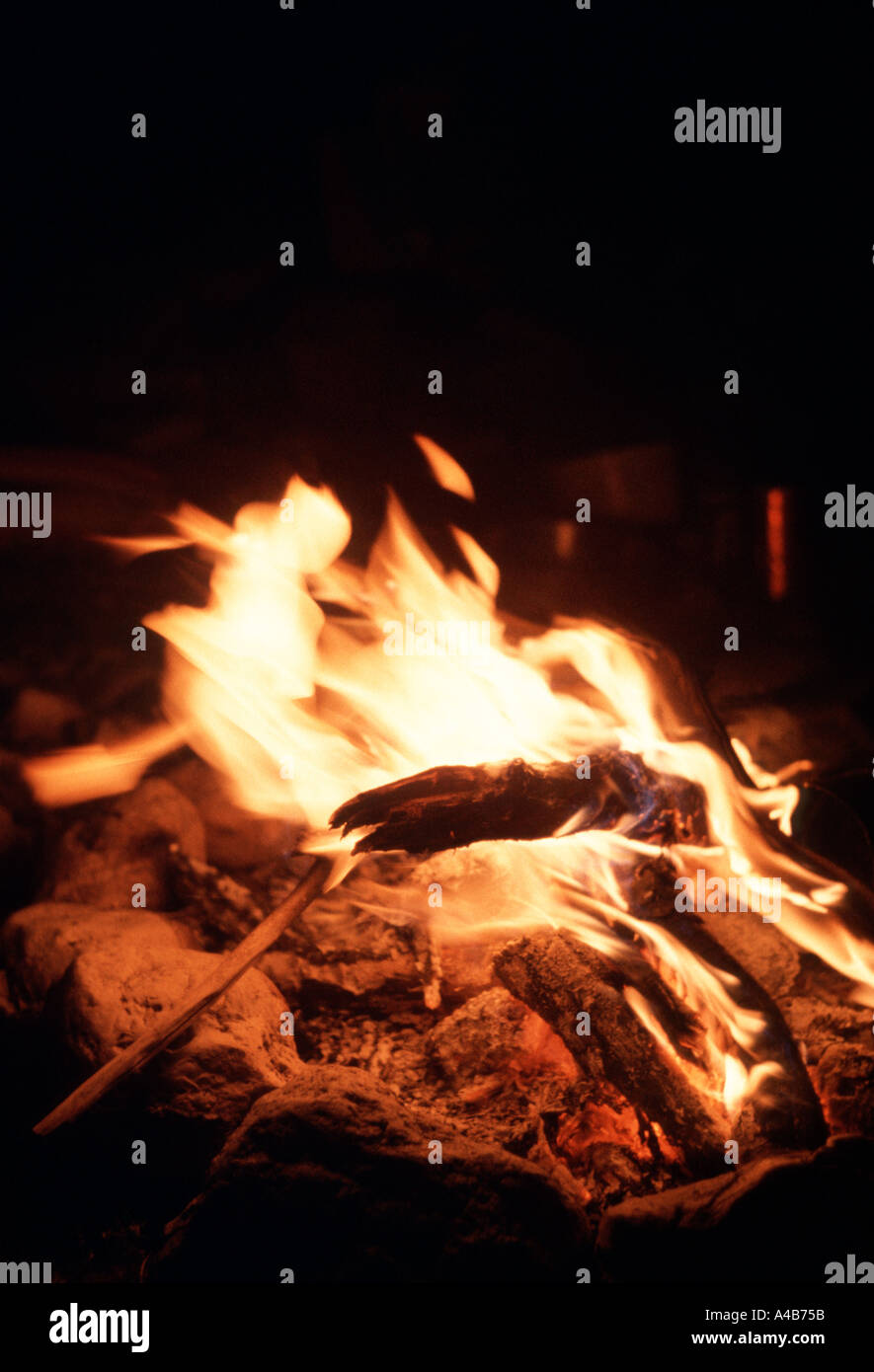 Camp fire on canoe trip Stock Photo