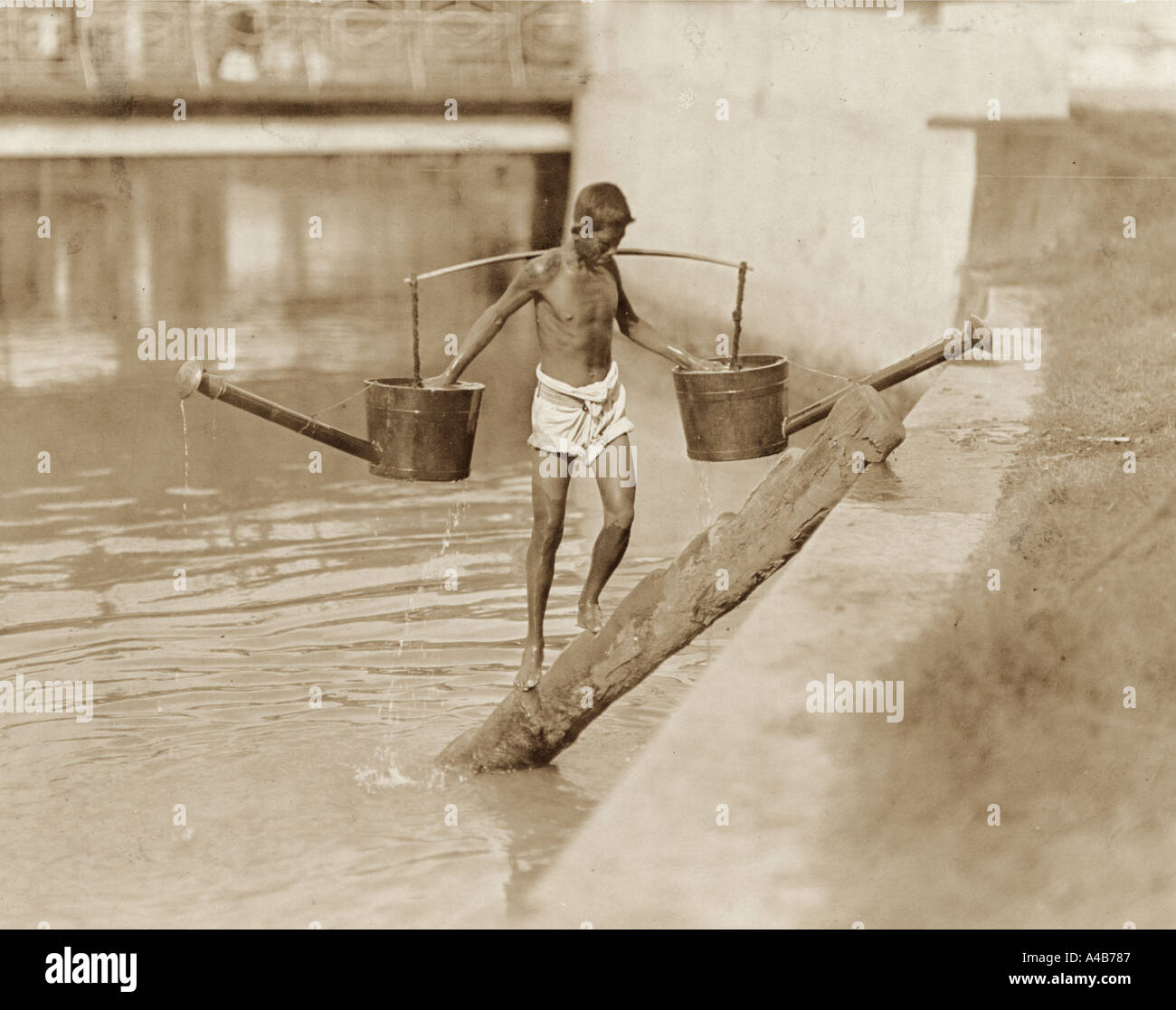 Bataria Street watering boy Stock Photo