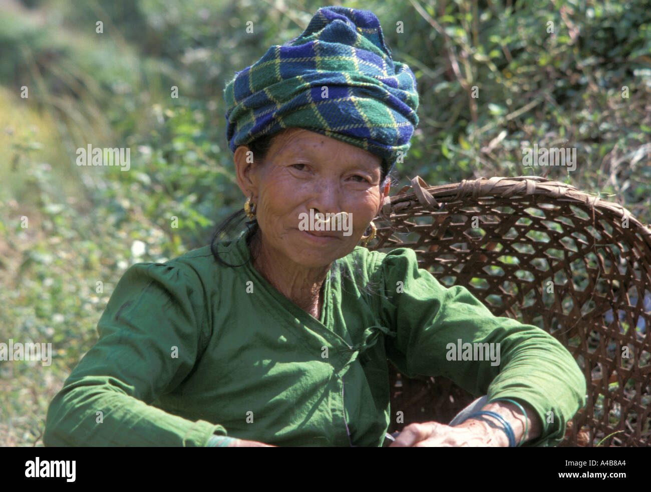 Woman selling fermented millet beer Stock Photo Alamy
