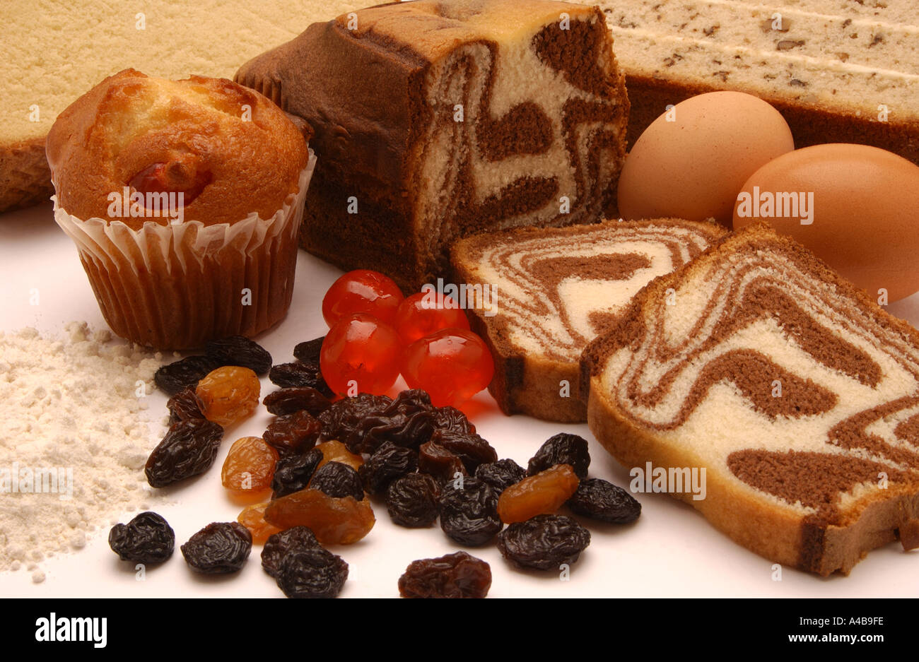 Close up of Freshly Baked Homemade Cakes cake muffin and Dried Fruit Stock Photo