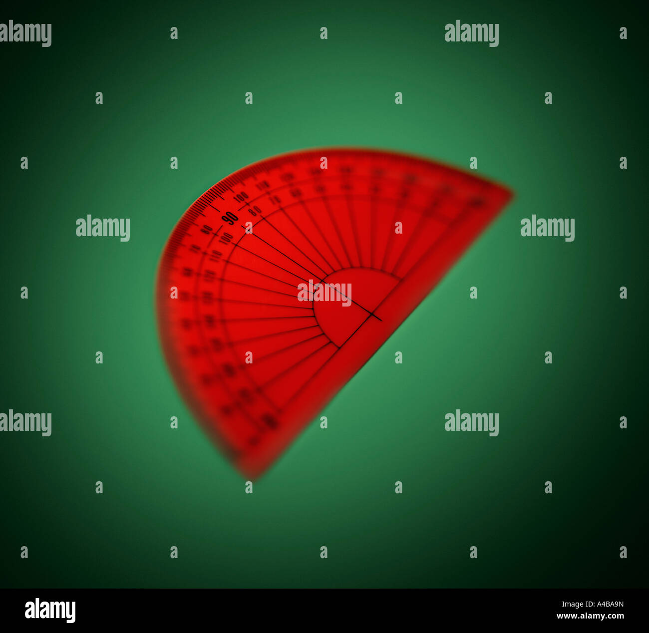 Floating red plastic protractor Stock Photo