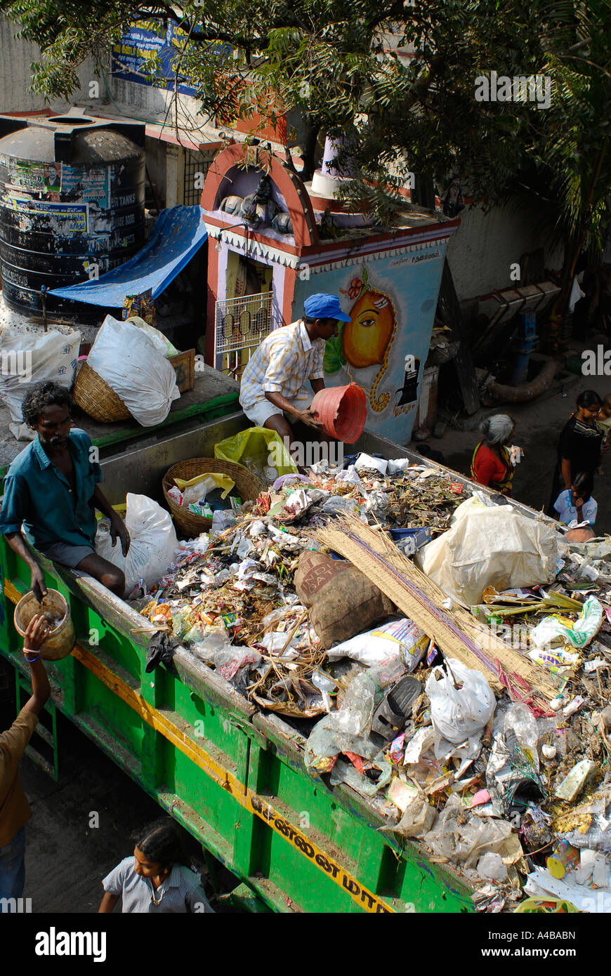 Stock image of garbage collection in Chennai slum Tamil Nadu India