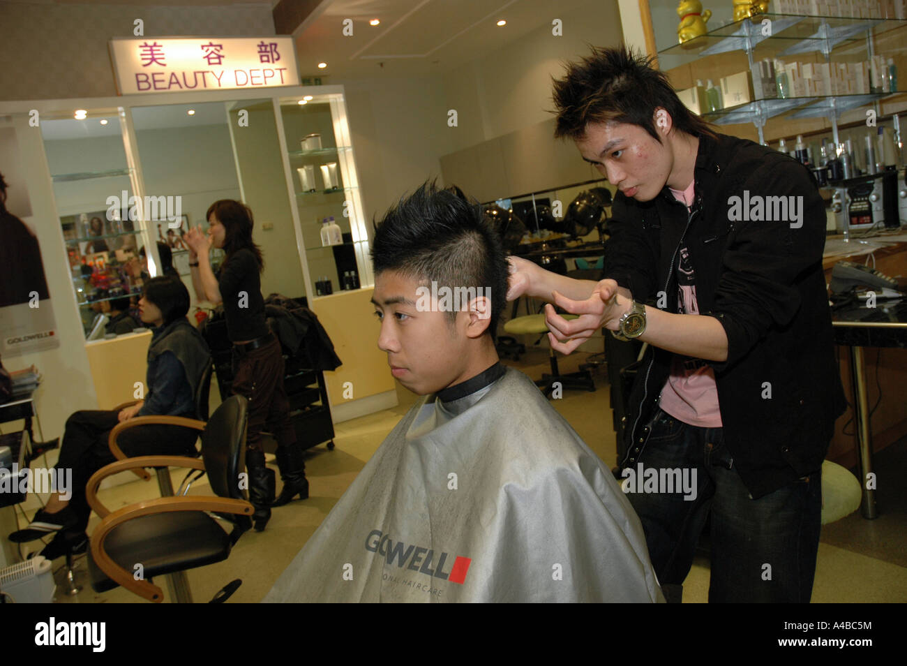 Hairdressers during Chinese New Year celebrations at Oriental City