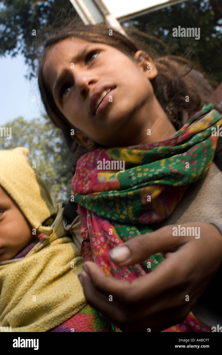 Young indian girl begging hi-res stock photography and images - Alamy