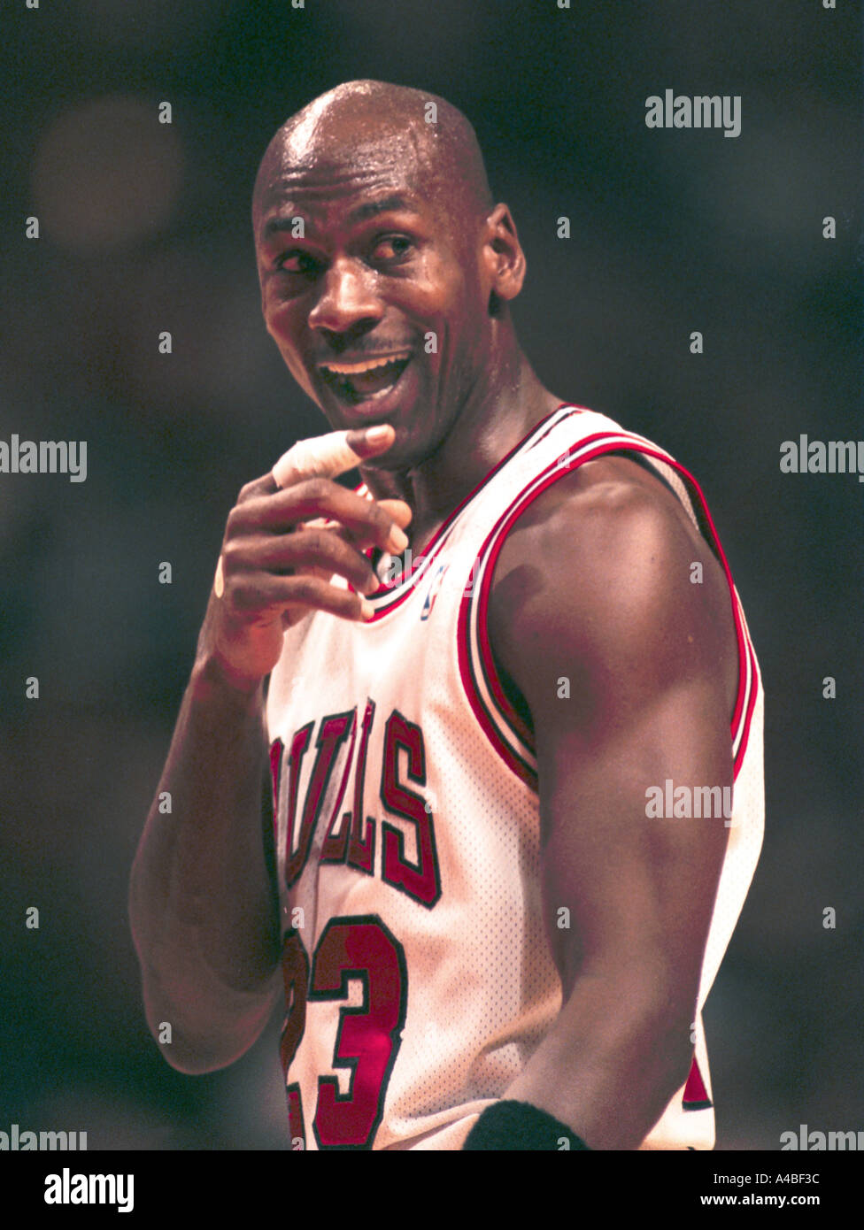 Chicago Bulls and NBA superstar Michael Jordan smiles during game action in 1995 Stock Photo