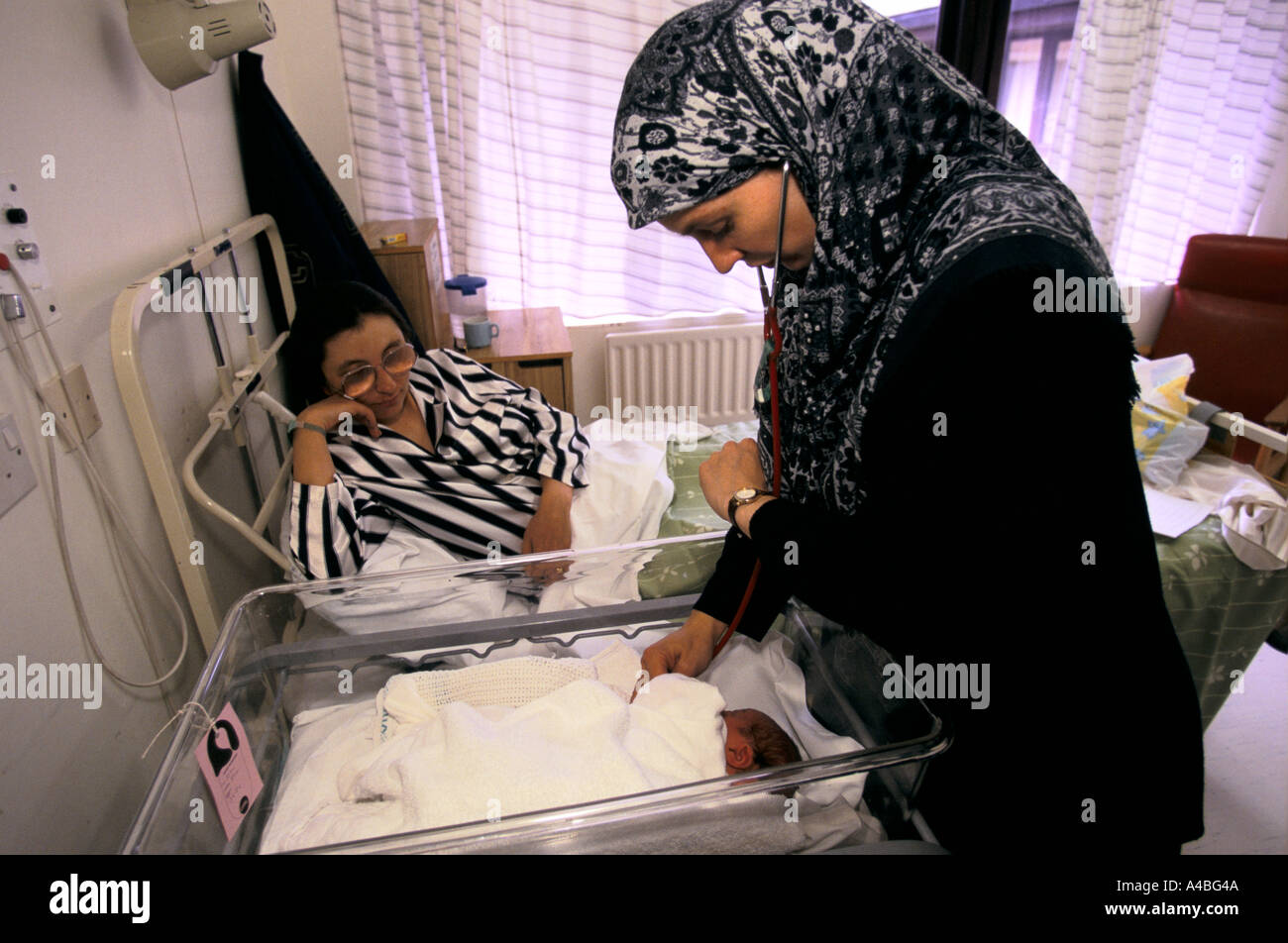 Maternity Unit, Homerton Hospital, London, England A midwife wearing