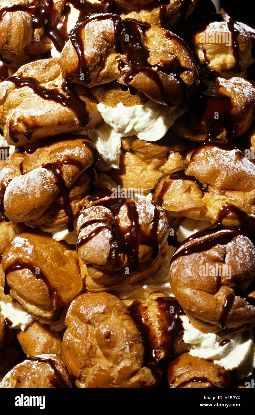 Cream cake eclairs Wales UK Stock Photo