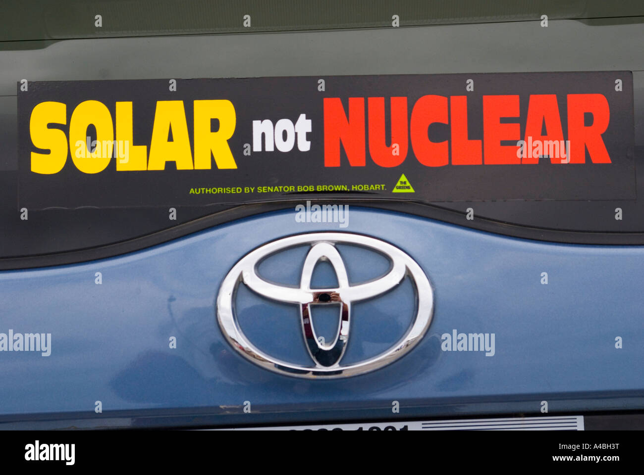 Car window sticker advocating solar power over nuclear energy Stock Photo