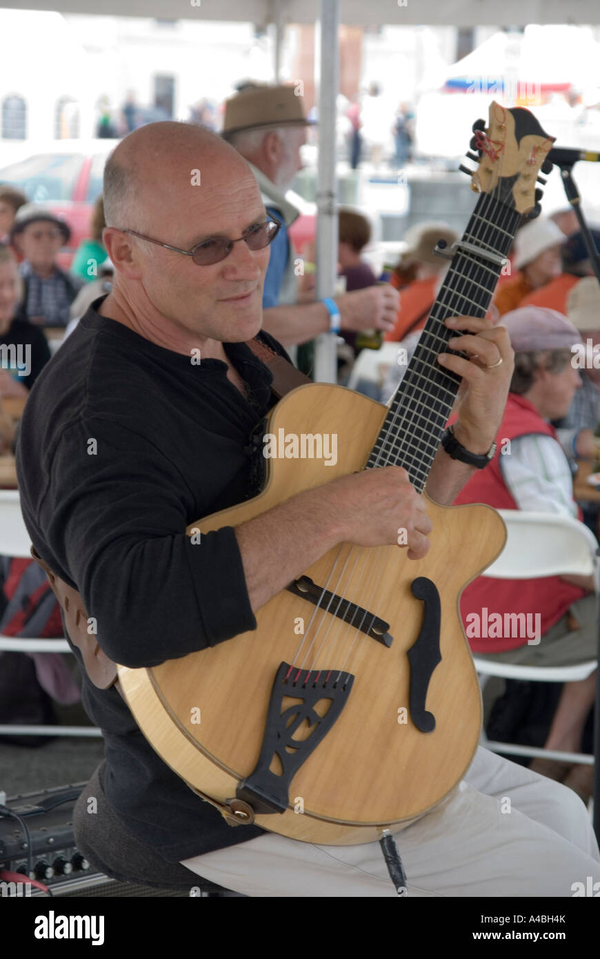 Australian Jazz guitarist Cary Lewincamp performs at the Australian Wooden Boat Festival in Hobart Stock Photo