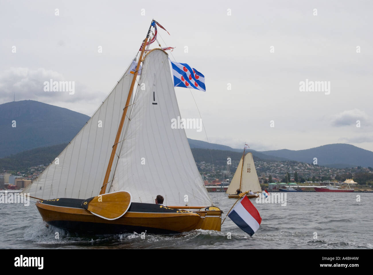 Traditional gaff rigged Dutch sail boat sailing on the Derwent River at Hobart Tasmania Stock Photo