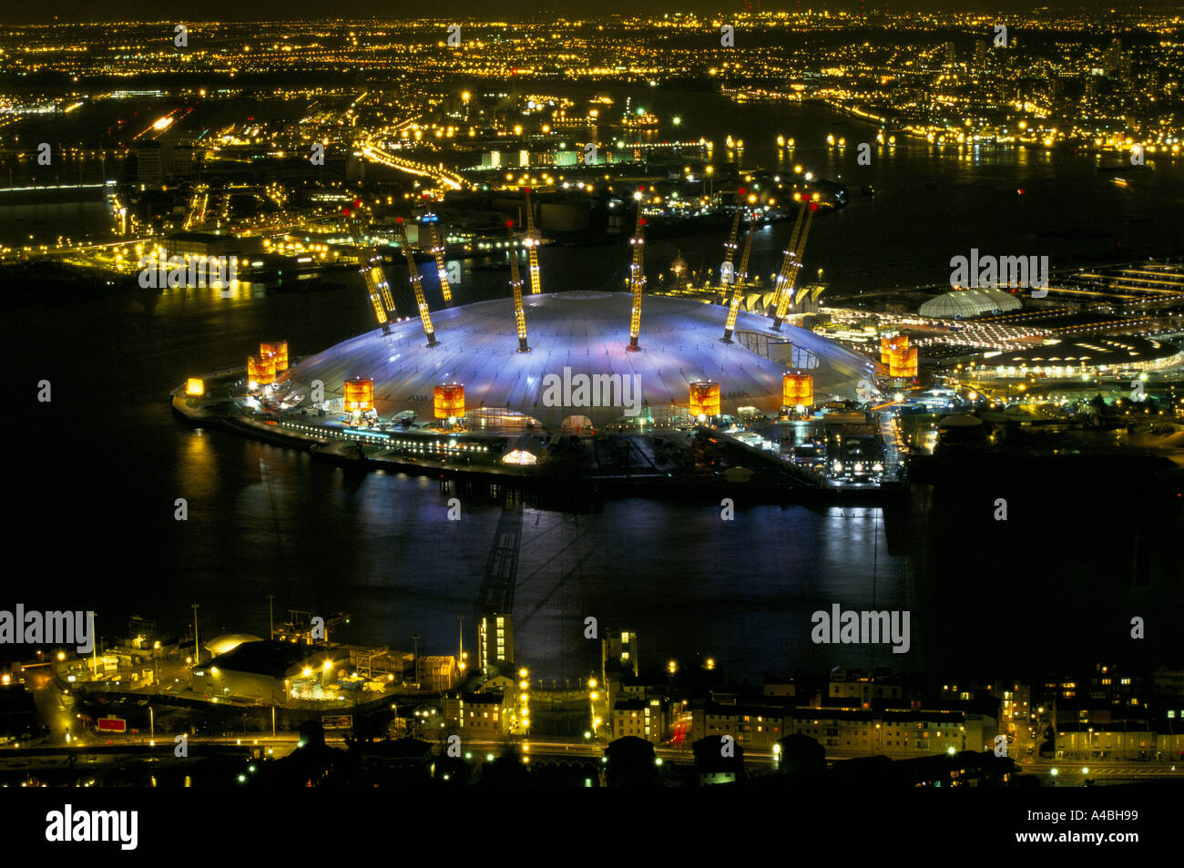 Aerial view of the the Millennium dome at night, illuminated from within by the changing colour displays, December 1999 Stock Photo