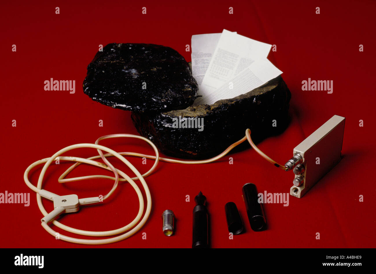 KGB Museum, Moscow Russia, USSR 1990 - Captured American spying equipment: Dead letterbox, cypher and pen camera Stock Photo