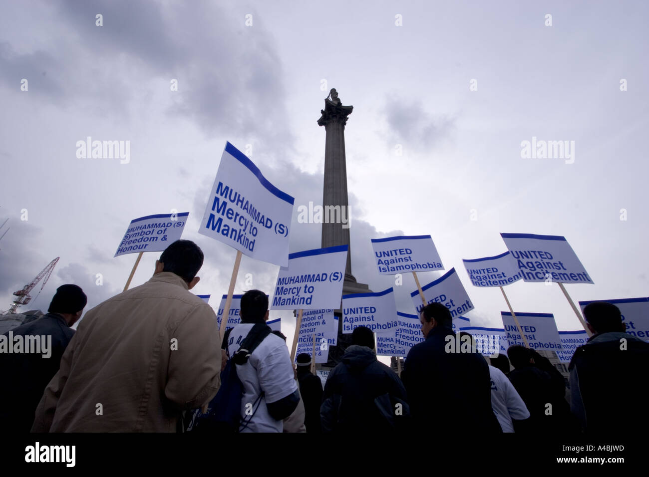 islamic protesters meeting in Trafalgar square demonstrating about islamophobia after publication of cartoon in Danish paper Stock Photo