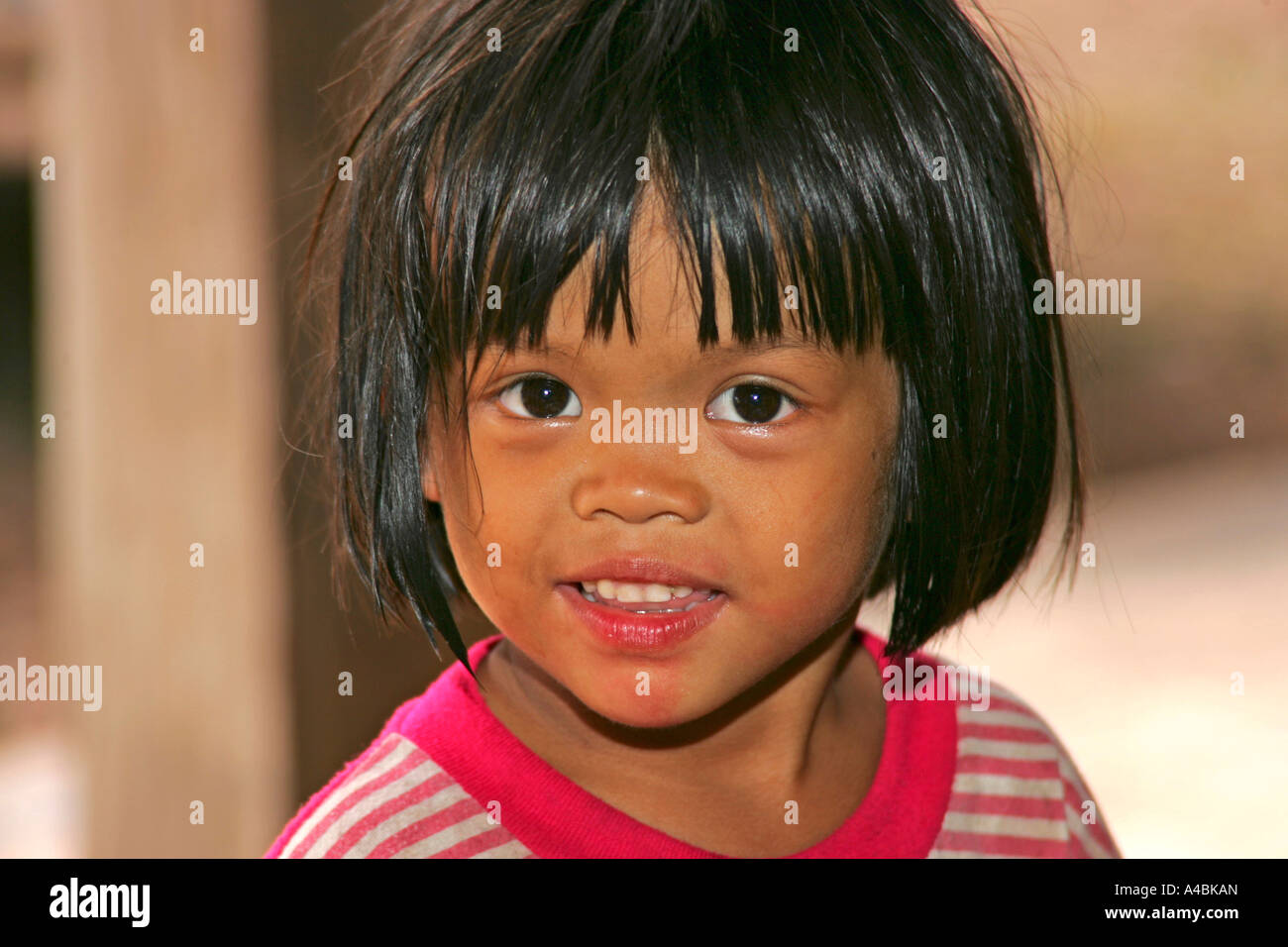 Portrait of little Thai girl Stock Photo - Alamy