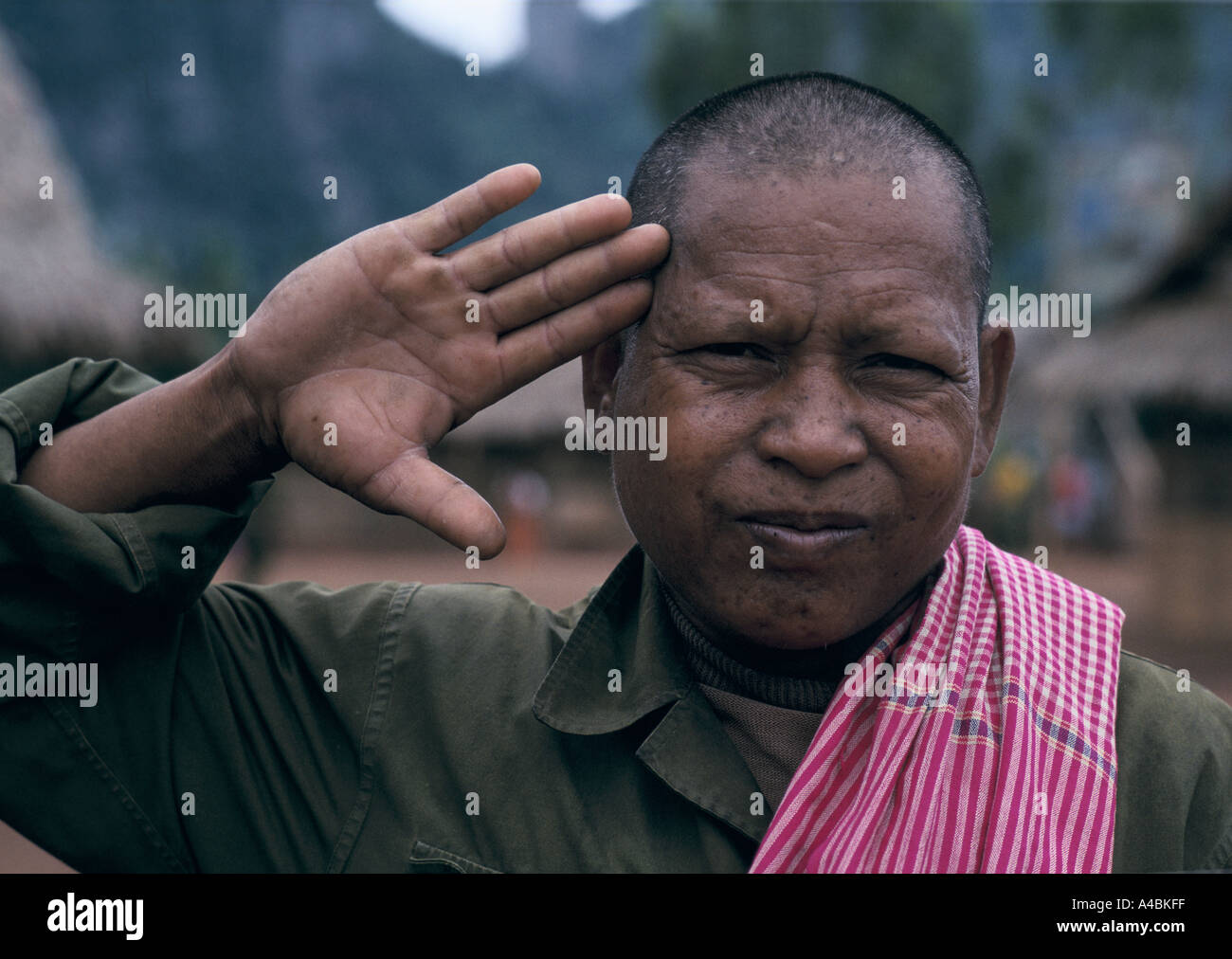 A Khmer Rouge solder gives a salute at Site 8, a refugee camp run by