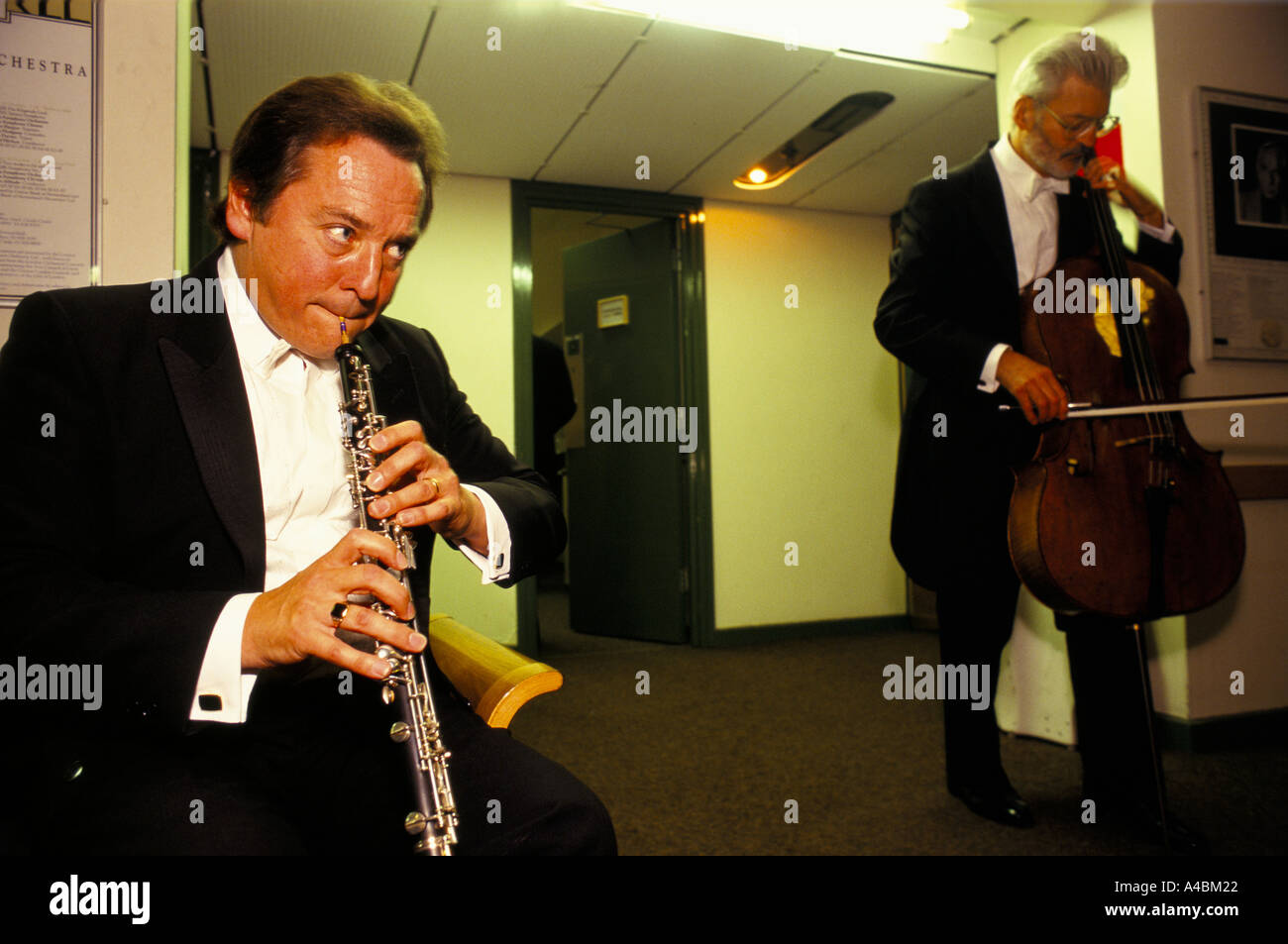 london symphony orchestra musicians prepare backstage for concert Stock