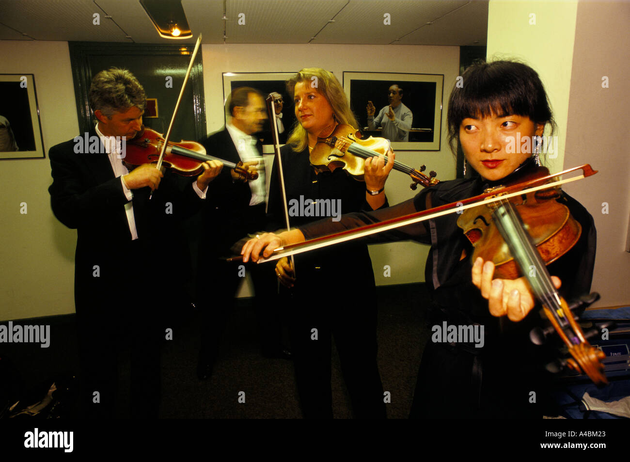 male female london symphony orchestra musicians prepare backstage in