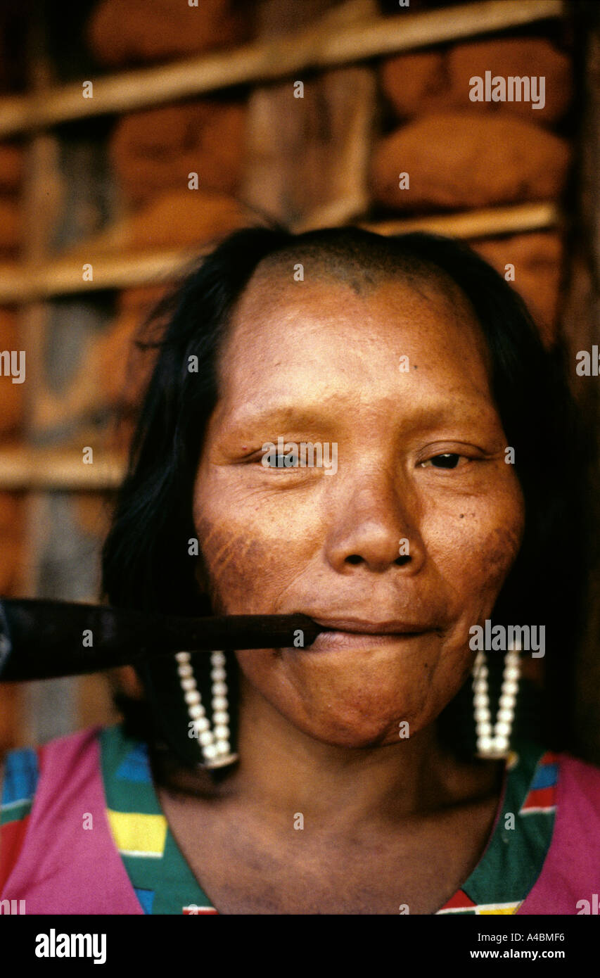 A-Ukre village, Xingu, Brazil. Irepa, a Kayapo woman, smoking a chillom pipe. Stock Photo