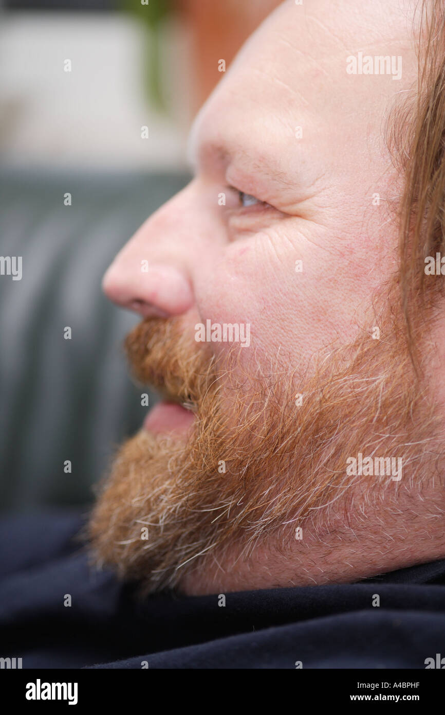 Middle aged man laughing Stock Photo