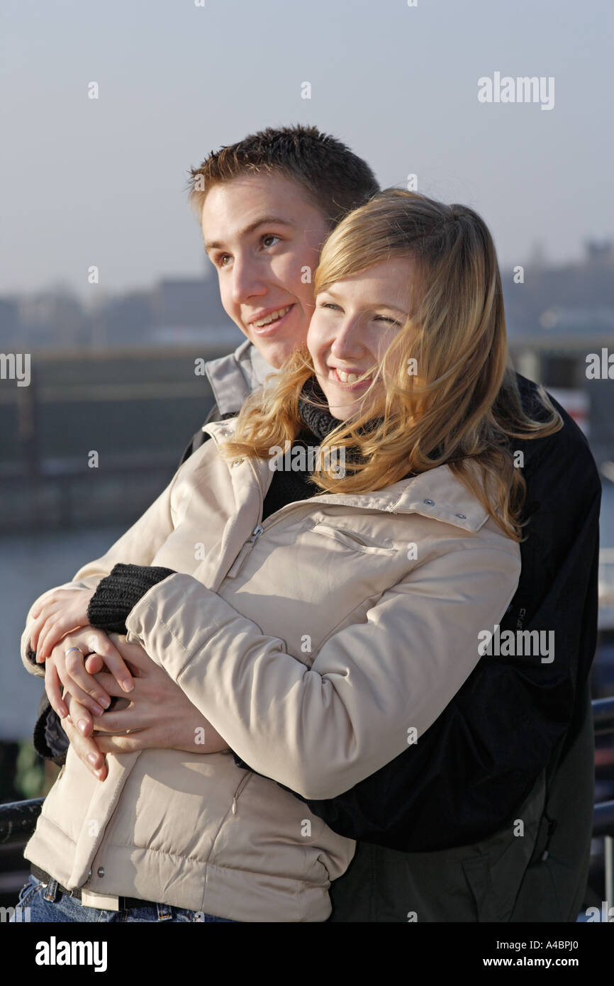Joyful young couple embraces hi-res stock photography and images - Alamy