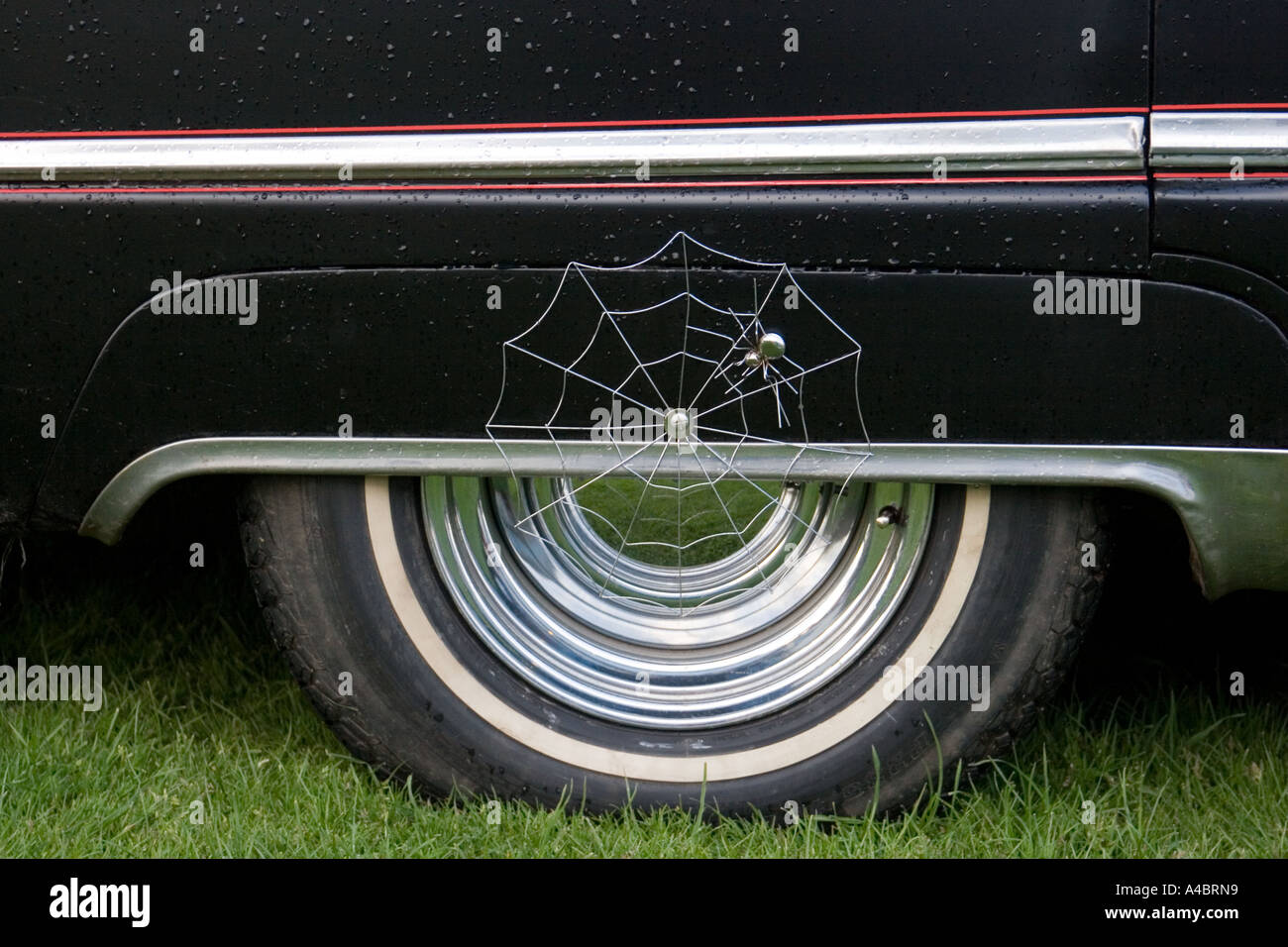 Rear wheel of 1953 Oldsmobile Rocket 98 with extras..! Stock Photo