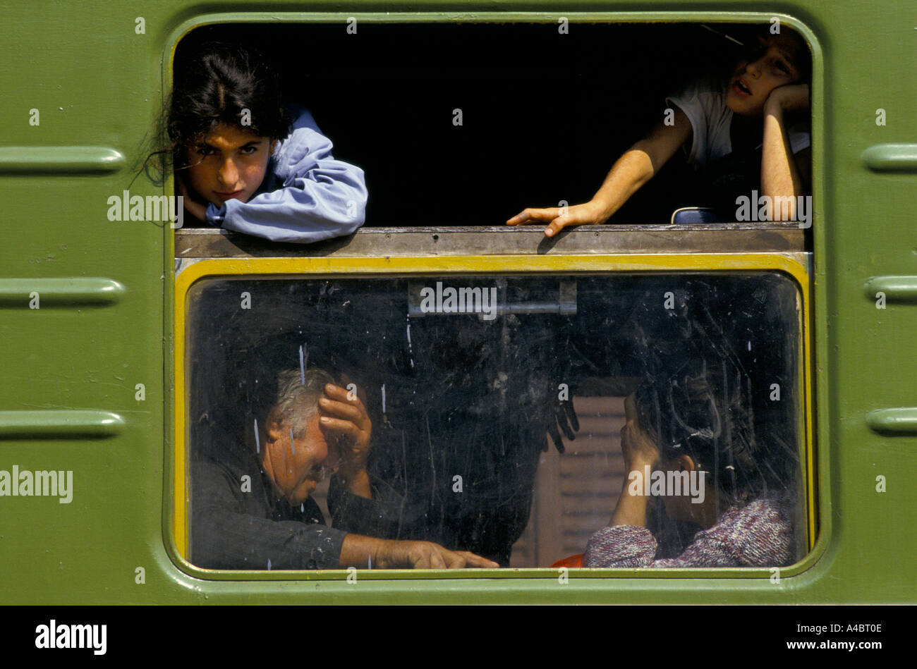 OCHAMCHIRE, GEORGIA, 28th SEPTEMBER 1993: Passengers at Ochamchire railway station on one of the last trains to leave the town on the day after the fall of Sukhumi to Abkhazian separatist forces. Stock Photo