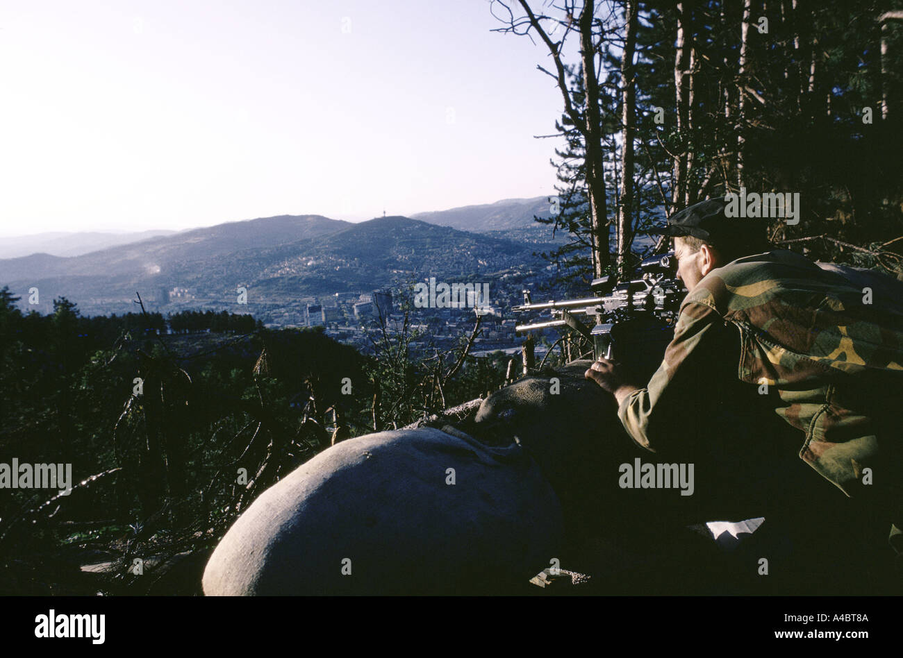 Serbian sniper at a Bosnian Serb front line position near Lukavica over looking the city of Sarajevo,  Sept 1992 Stock Photo