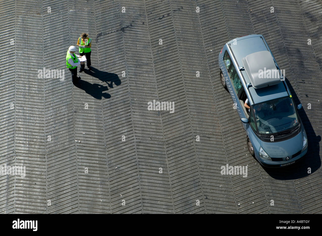 Car driving past loading staff on to P&O ferry Pride of Bilbao