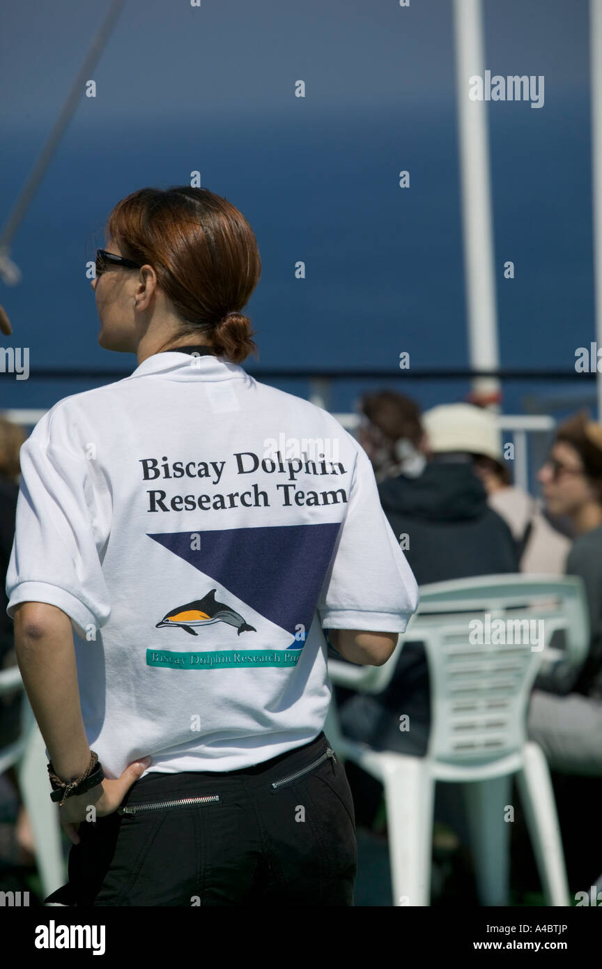 Rear view of female member of Biscay Dolphin Research Team wearing t-shirt on board P&O ferry Pride of Bilbao, Bay of Biscay Stock Photo