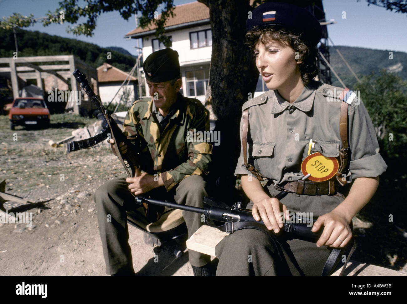 Sarajavo  : A Seb male and female soldier operate a Bosnian Serb military checkpoint north of the city,  Sept 1992 Stock Photo