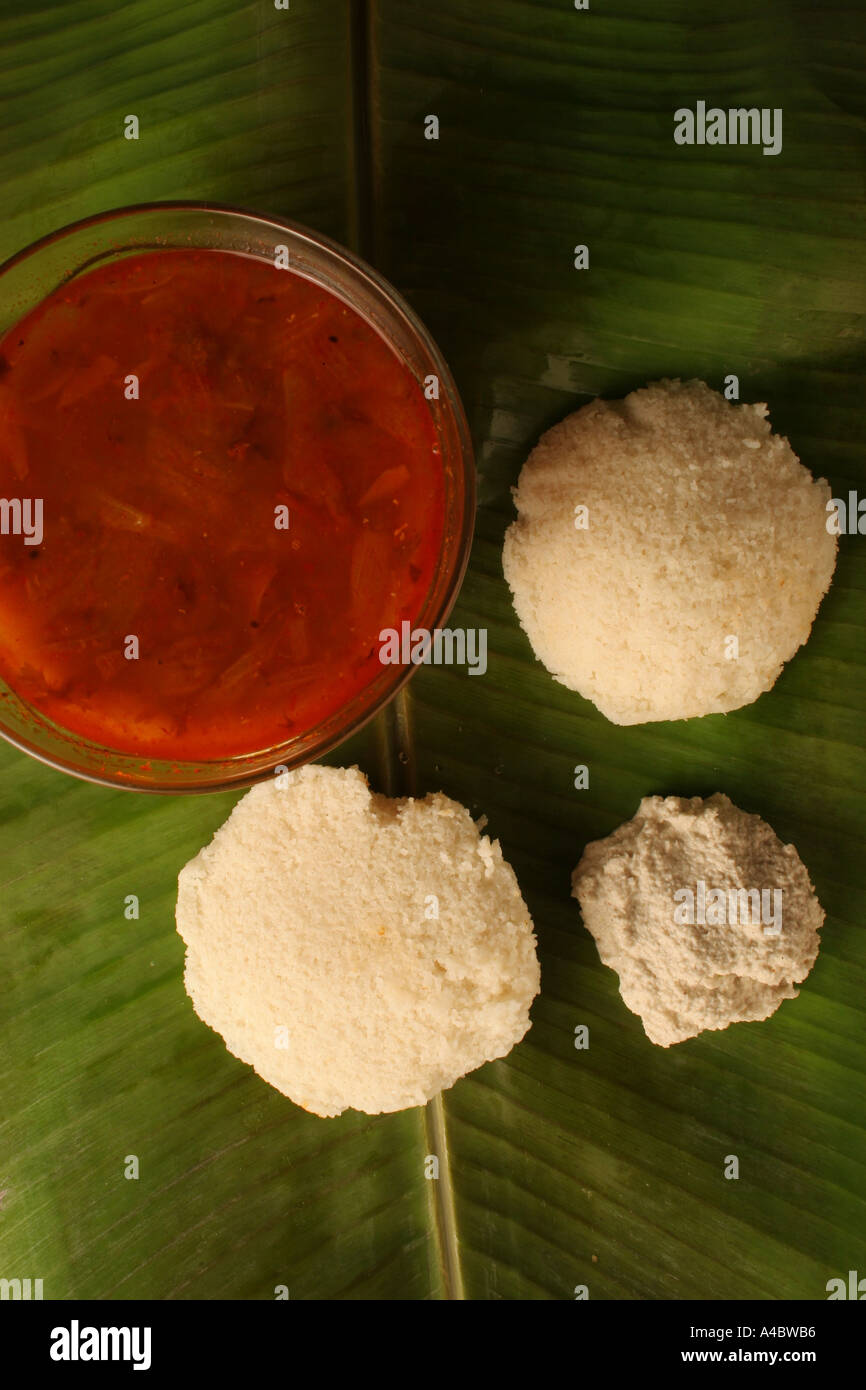 Idli Sambar, traditional South Indian breakfast on banana leaf Stock Photo